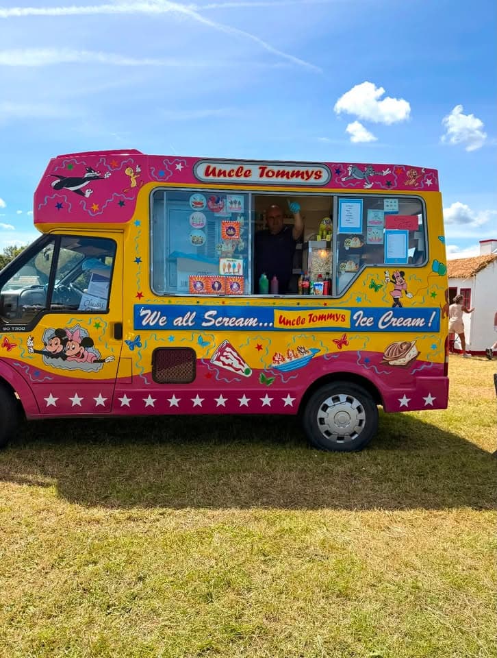 Families enjoying ice cream at a community fun day